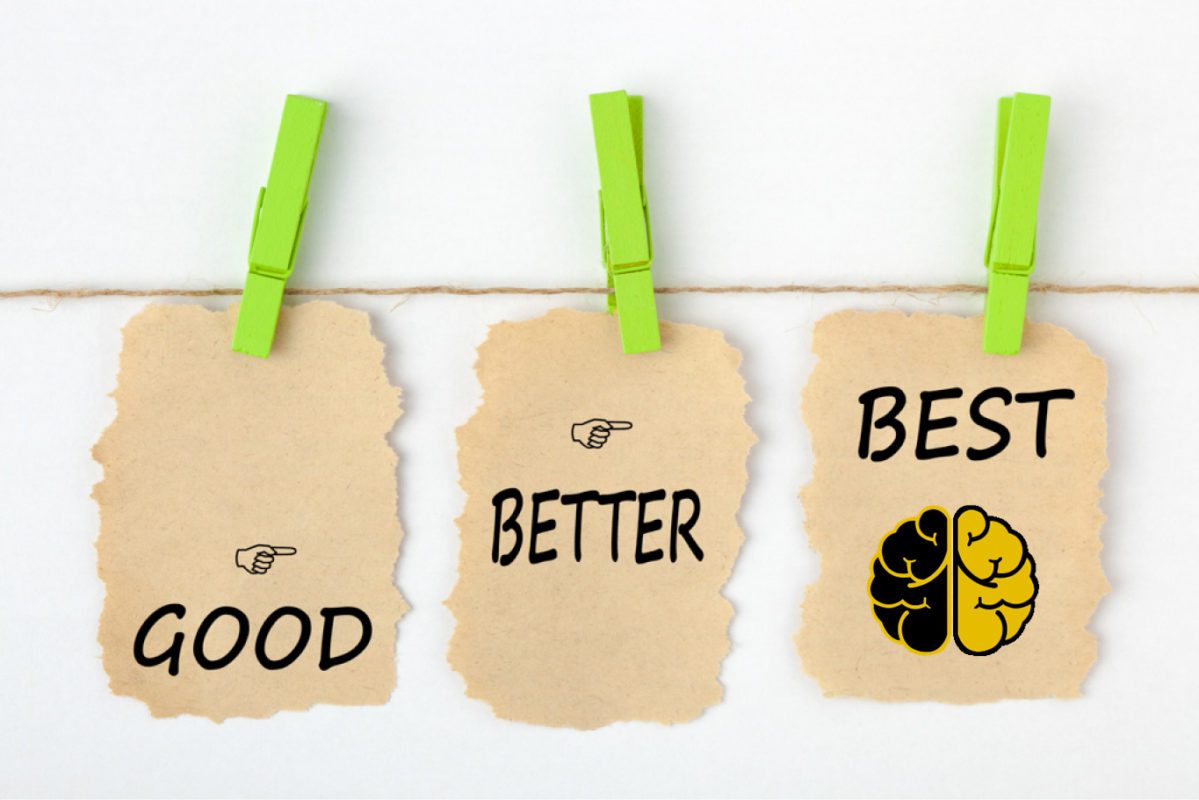 Three scraps of manilla paper clipped to a clothesline read "good," "better" and "best."