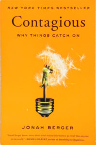 The cover of the book "Contagious" by Jonah Berger.