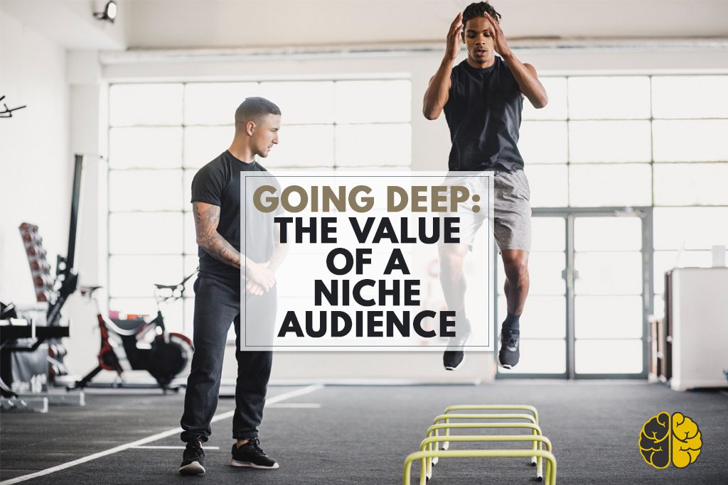 A coach encouraging another man through drills - going deep - the value of a niche audience