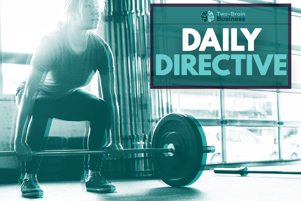 A woman prepares to lift a barbell, with the words "Two-Brain Business Daily Directive" as a caption.