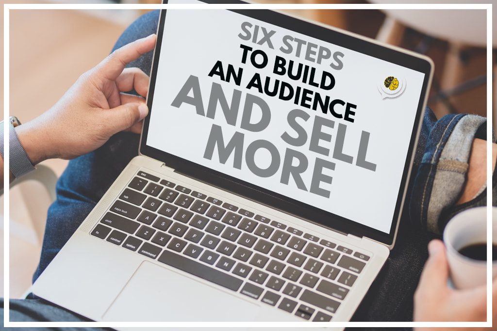 Man drinking coffee and reading 'six steps to build an audience and sell more' on a laptop