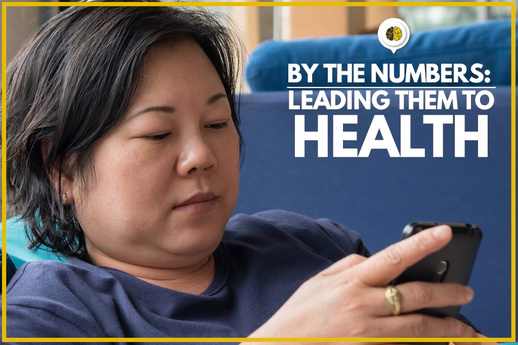An overweight woman scrolling on her phone - by the numbers: leading them to health