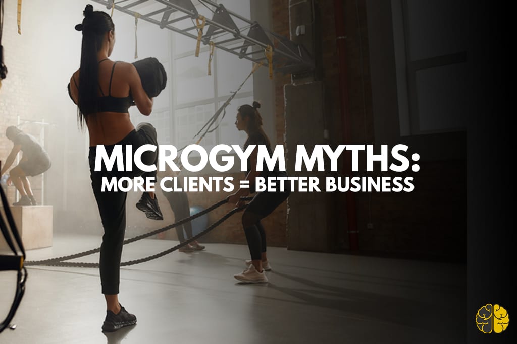 A handful of clients in a crossfit gym - Microgym Myths - More clients = Better business