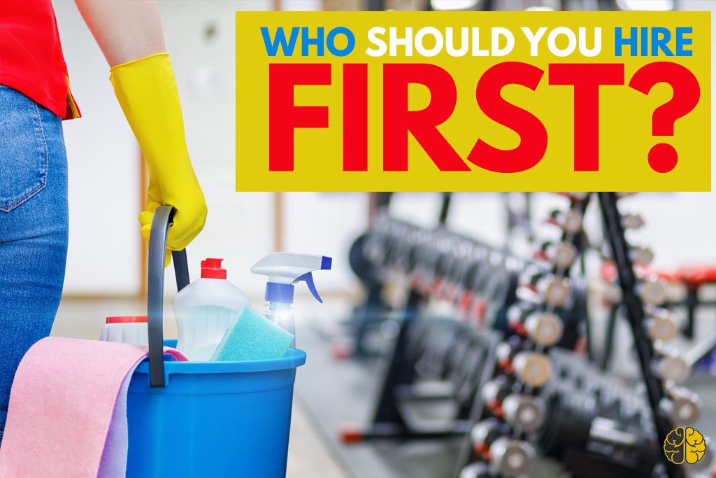 A shot of a cleaner carrying a bucket of supplies - who should you hire first?