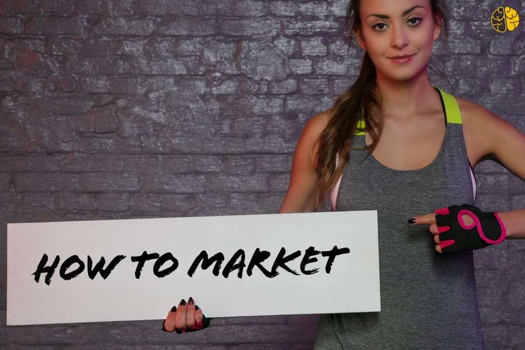 A young woman pointing at a sign - how to market