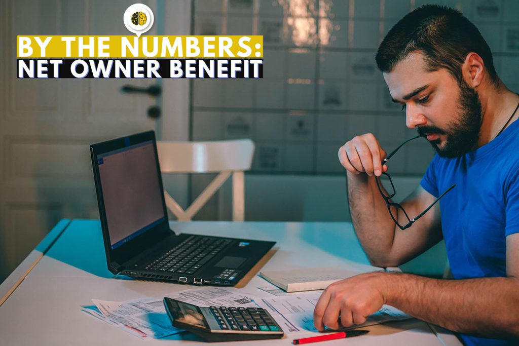 A gym owner doing his finances - by the numbers - net owner benefit