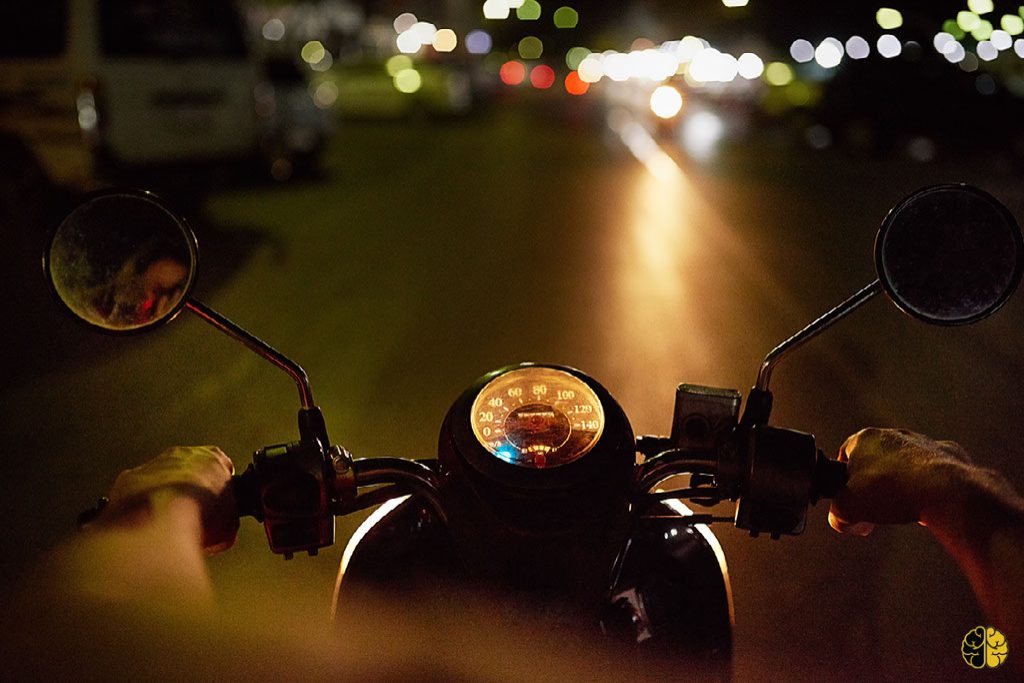 High speed - low drag - a man on a fast motorcycle at night