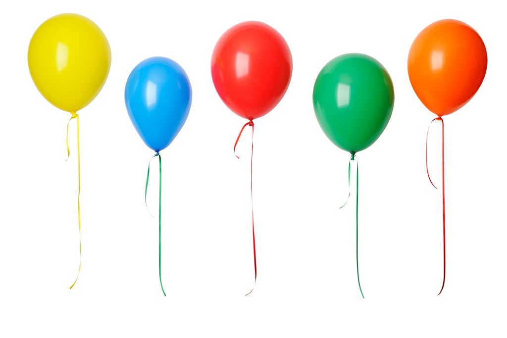 Row of five colorful balloons with ribbons isolated on a white background.