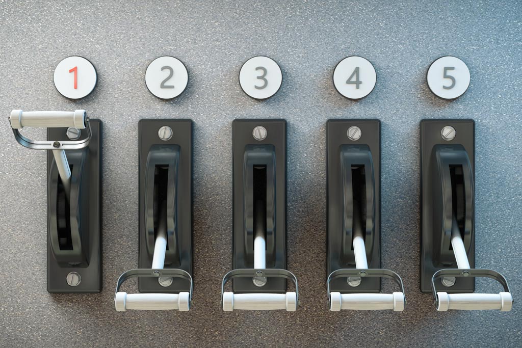 A series of five numbered levers.
