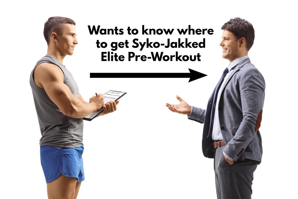 A client in a suit consults a personal trainer about pre-workout supplementation.