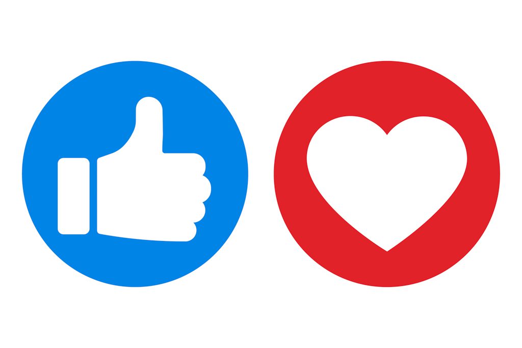 A large heart and thumbs-up icon to represent social media success by a gym.