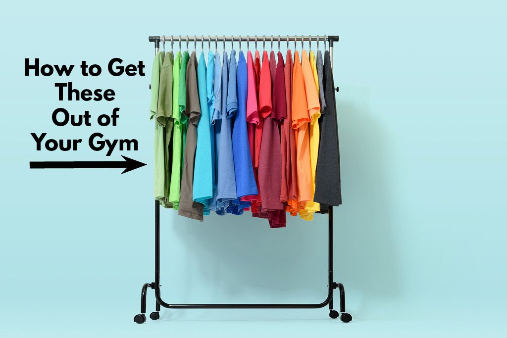 A rack of T-shirts with the words "how to get these out of your gym."