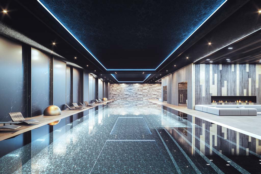 A photo of the pool and spa area of a high-end wellness facility.