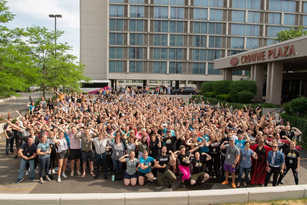 A photo of 600 gym owners and coaches in front of the Crowne Plaza in Chicago during the 2023 Two-Brain Summit.