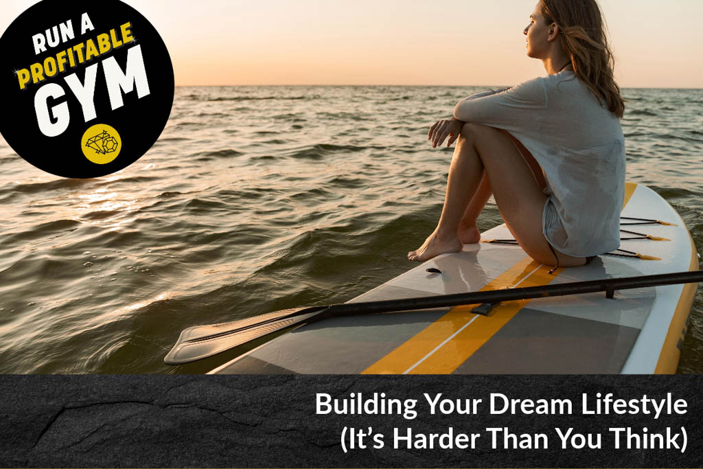 A photo of a woman on a surfboard with the words "building your dream lifestyle."