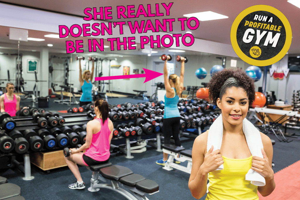 A photo of a woman in a gym with the words "she doesn't want to be in the photo."