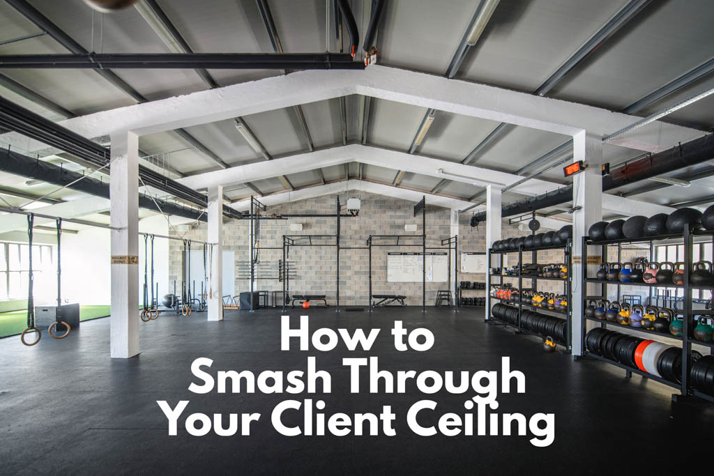A photo of an empty gym with the text "how to smash through your client ceiling."