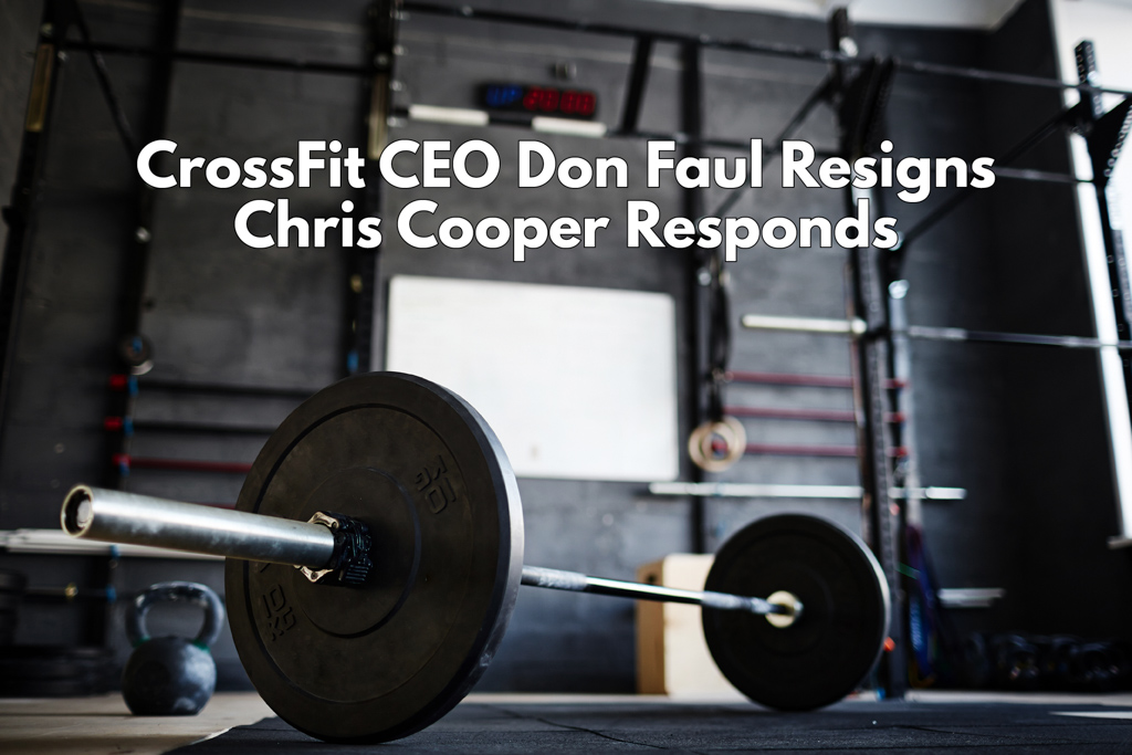 A photo of a barbell in an empty functional fitness gym.