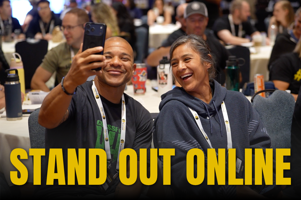Gym owners recording a video at the Two-Brain Business Summit with text "STAND OUT ONLINE"