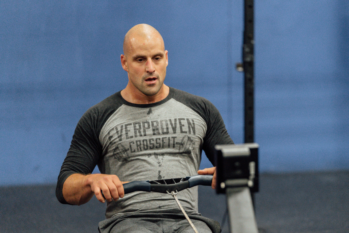 Gym owner Matt Michaud rowing